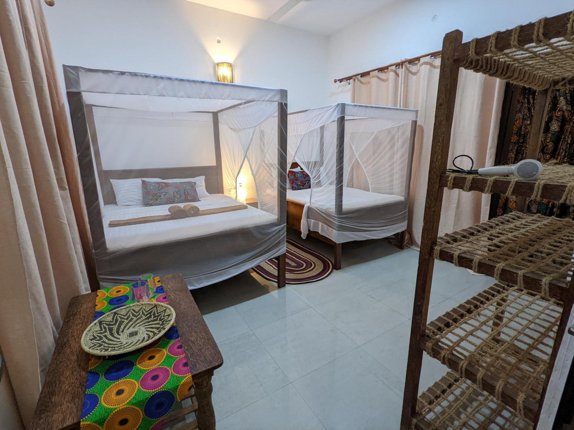 Готель Mkadi Beach House Нунгві Номер фото