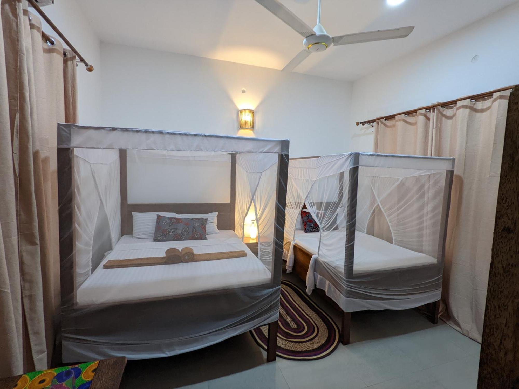 Готель Mkadi Beach House Нунгві Номер фото